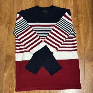 Bold Blue and Red Crewneck Sweater with Striking Patterns